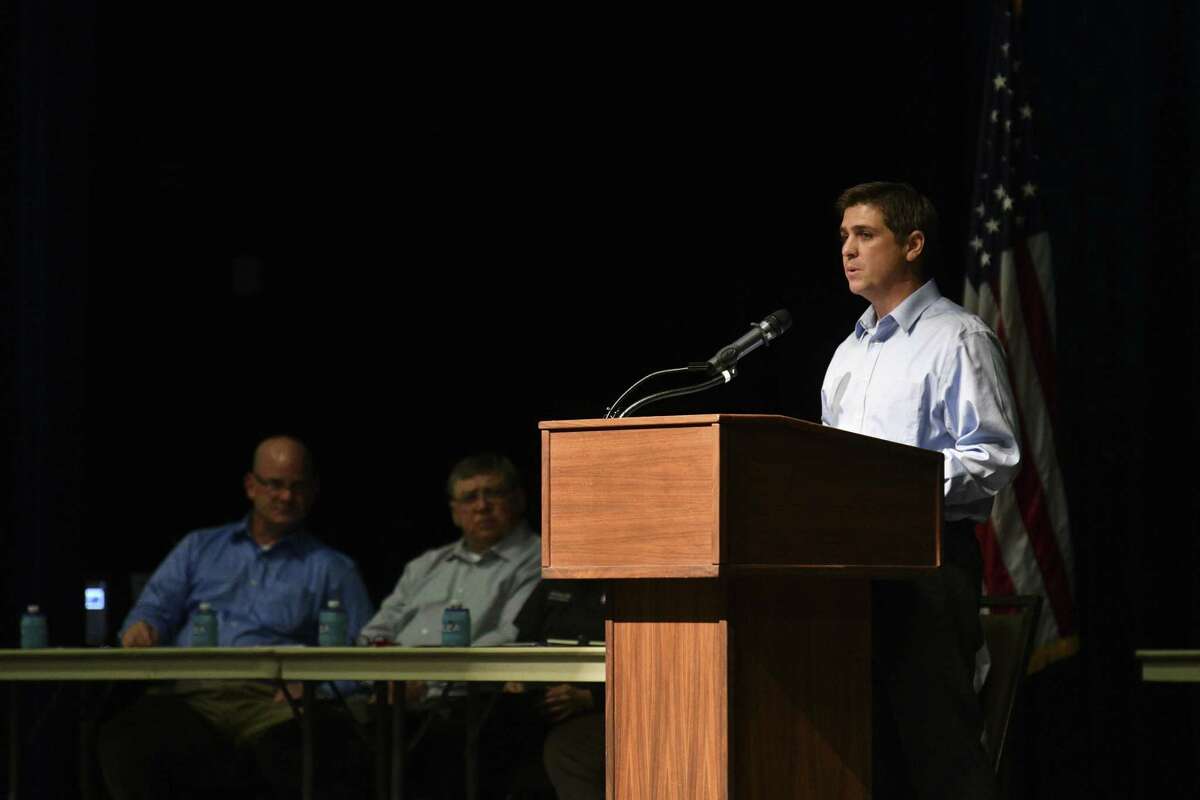 Kevin Patteson, general manager and CEO of the Guadalupe Blanco River Authority, speaks during a Preserve Lake Dunlap Association meeting to discuss the status of the lake and its failed dam, at the New Braunfels Convention Center on June 5, 2019. The middle spill gate of the dam that forms Lake Dunlap collapsed on May 14, draining much of the lake.