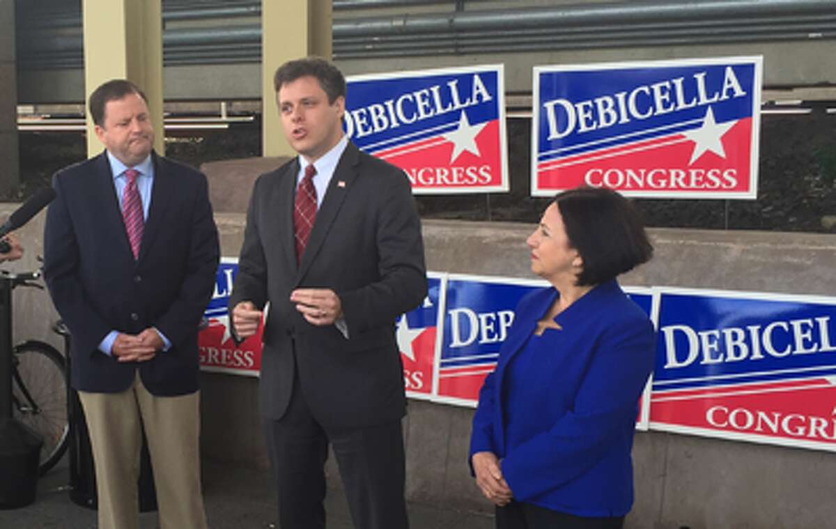 Dan Debicella, center, candidate for Congress, is joined by state Senate Minority Leader John McKinney and state Sen. Toni Boucher while releasing his transportation plan at the Westport train station. All three are Republicans.