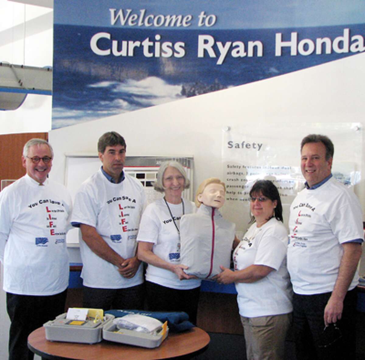 Attending the presentation of a CPR unit to Griffin Hospital are, from left, James Fleming of the Connecticut Automotive Retailers Association; Rick Foehrenbach of Curtiss Ryan Honda; Daun Barrett of Griffin Hospital Community Outreach and Valley Parish Nursing; Cathi Kellett of Griffin Hospital CPR Training Center; and Edward DeMarseilles of Curtiss Ryan Honda.