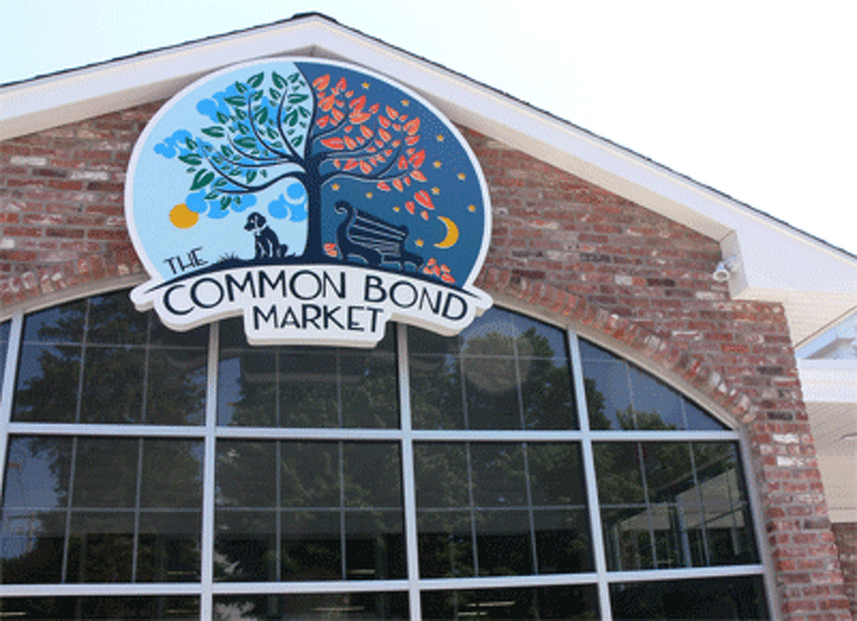 The store sign and new entrance to the Common Bond Market in Shelton’s Huntington Center.