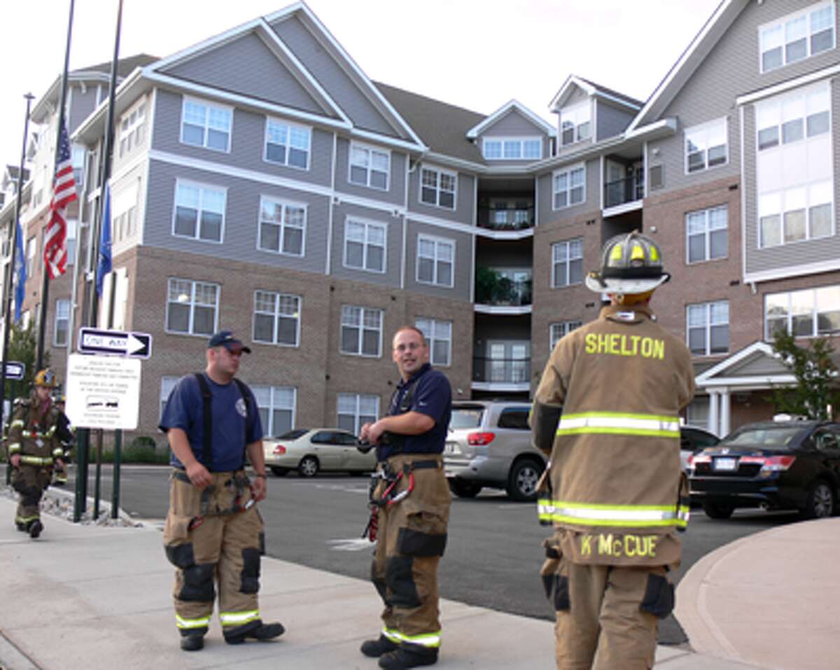 Shelton fire personnel at the scene of a reported gas smell at the Shelton Avalon apartments on Canal Street.