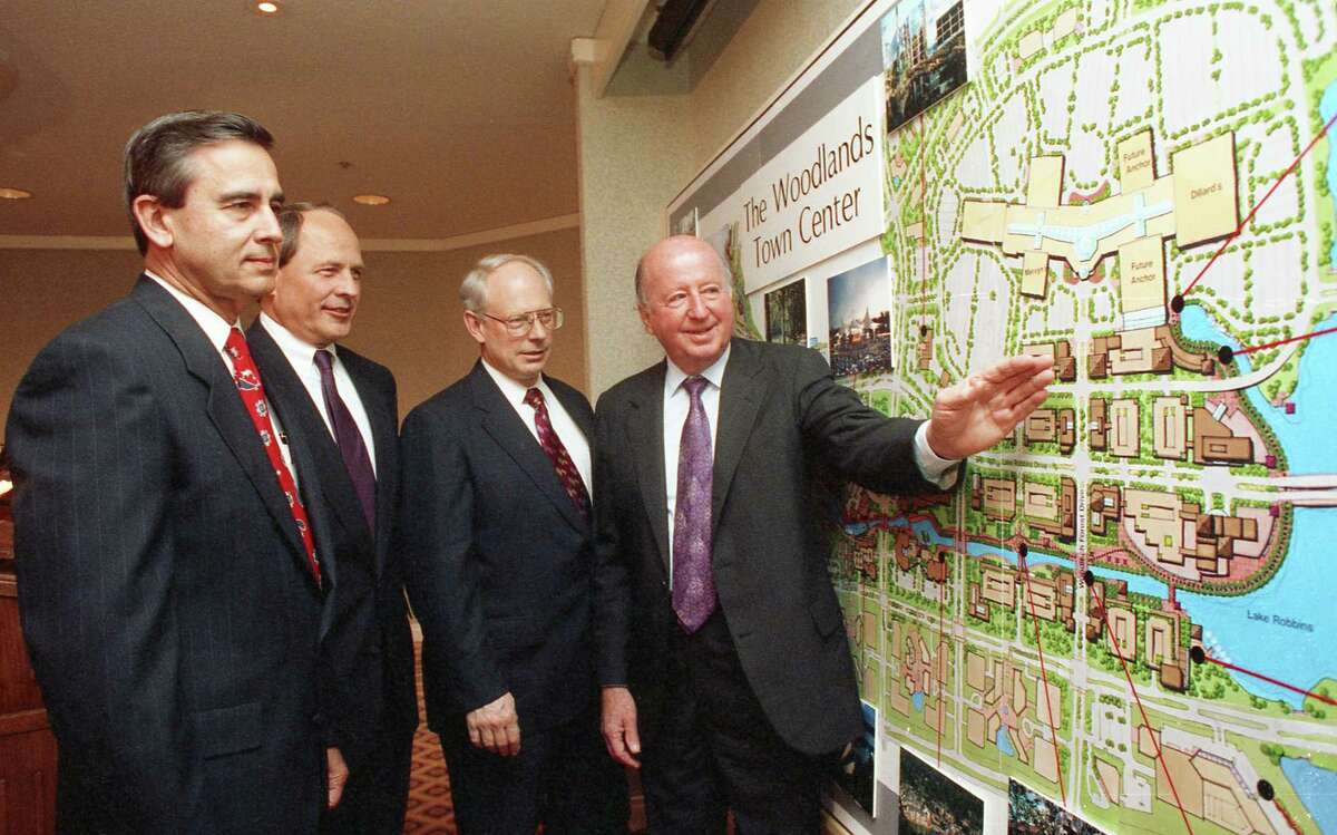 03/11/1993 - (L-R) Roger L. Galatas, president and chief operating officer of The Woodlands Corp., Donald R. Andrus, Foley's chairman, Richard Welcome, executive vice president of Homart Development and George Mitchell, chairman and president of Mitchell Energy and Development look at a map of the site for The Woodlands Mall. An oil tycoon and real estate developer, Mitchell is often the figure credited for The Woodlands’ success. When Mitchell saw the potential of the area to be a master-planned community, he brought others on-board such as Tom Cox, Jeff Harris and Roger Galatas to make it happen. Though Mitchell passed away in 2013, the three other men formed the invitation-only George’s Coffee Club in 2016 as a way to honor, respect and communicate George Mitchell’s vision for The Woodlands as a place to “live, work, play and learn”.
