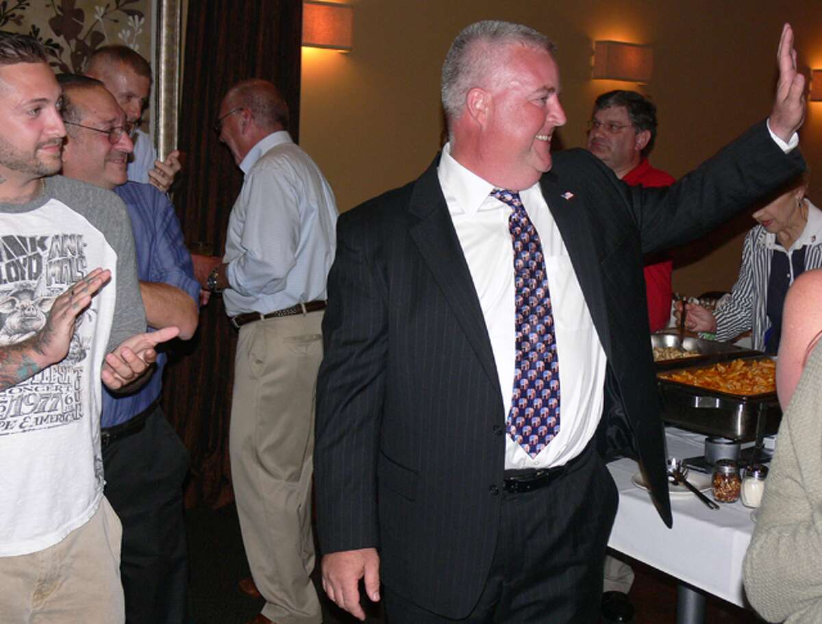 Ben McGorty is congratulated by supporters after winning the special election during a celebration at Vazzy's in Shelton.