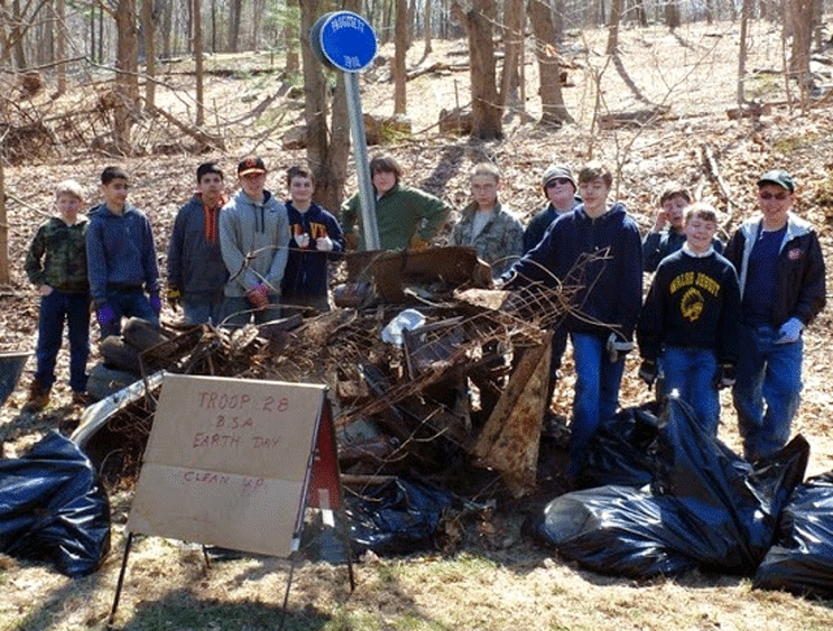 Boy Scout Troop 28 members with some of the debris they picked up on Shelton Avenue, near the Shelton Dog Park.