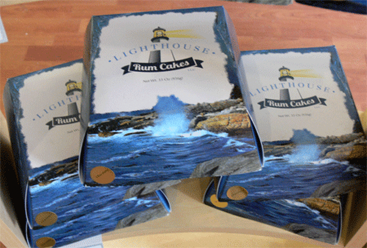The gourmet rum cakes come in packages with a nautical theme.