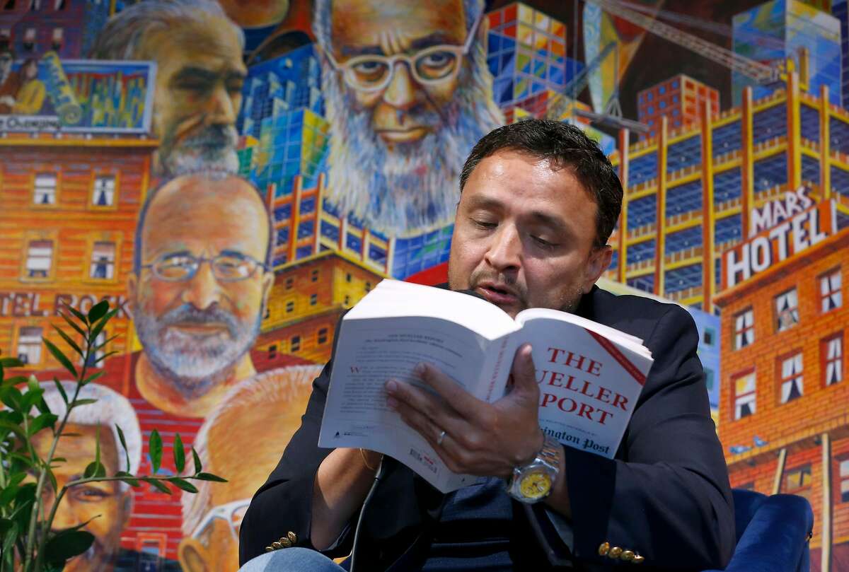 Former supervisor David Campos reads text from the Mueller Report during a collaborative all-day reading of the entire report at Manny's cafe and community meeting room in San Francisco, Calif. on Thursday, June 6, 2019. Around 50 volunteers read 15 to 30 minute segments of the report from beginning to end for 16 hours.