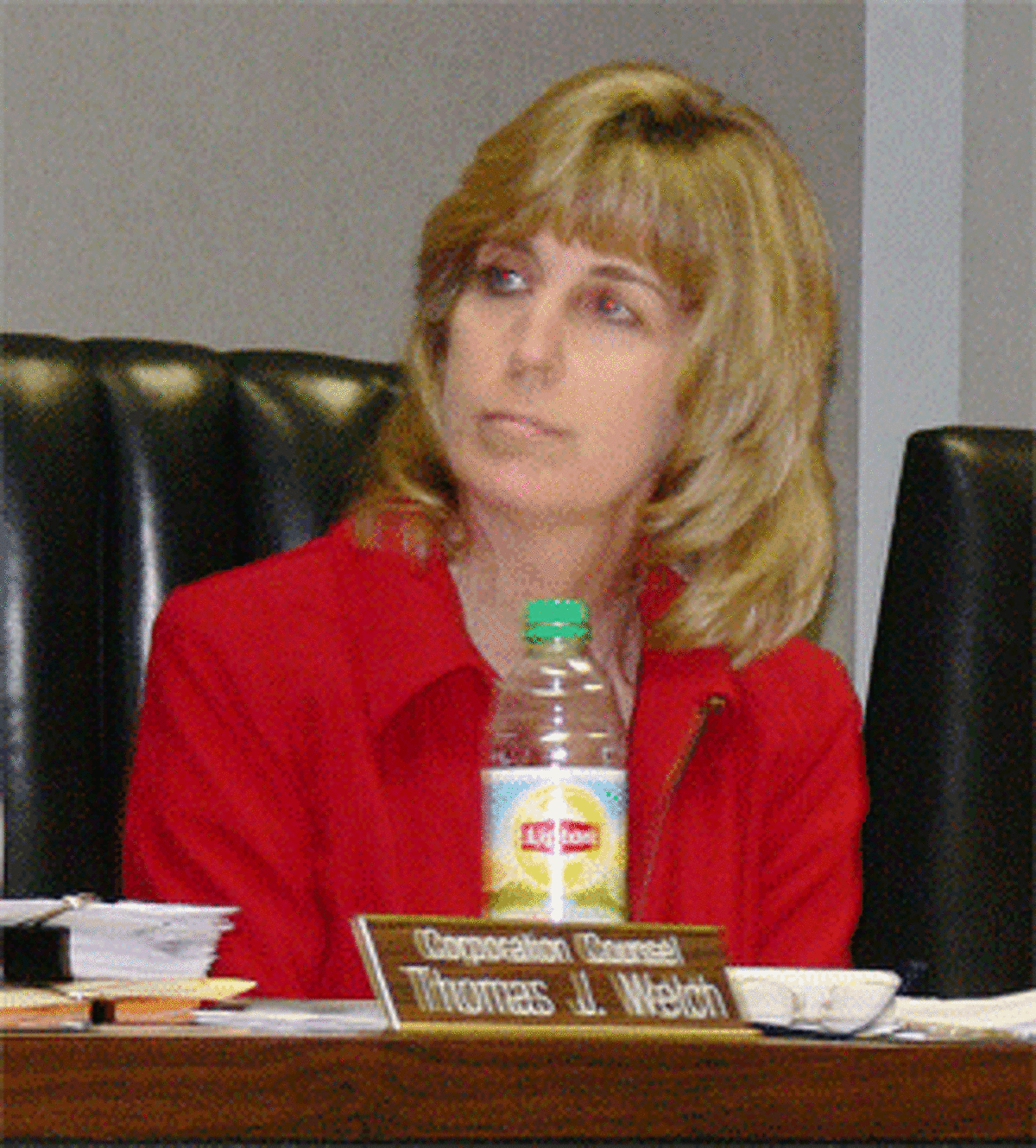 Alderman Noreen McGorty listens to an answer to a question she asked about the budget.