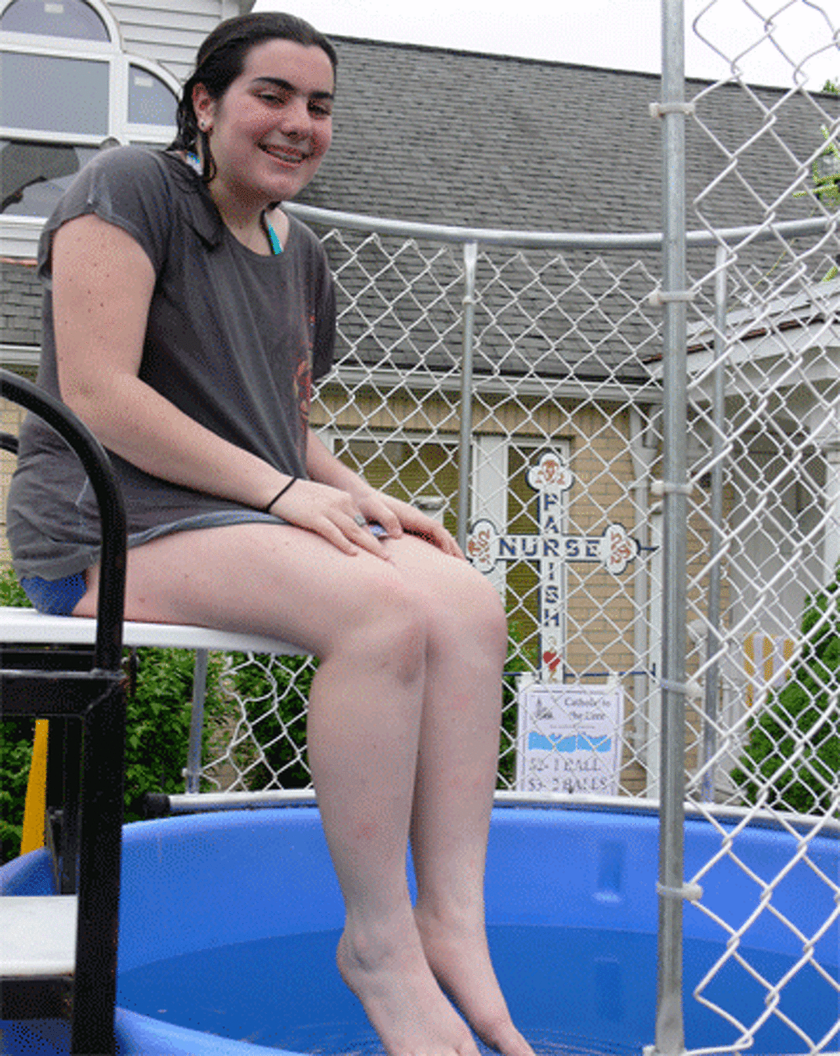 Olivia Mantero, 14, of Shelton doesn’t mind getting wet in the dunk pool at the St. Joseph Carnival and Food Fest because she’s helping to raise money for the Catholic school that she attends. “It’s worth it, especially when you see the kids smiling after they put me in,” Olivia said.