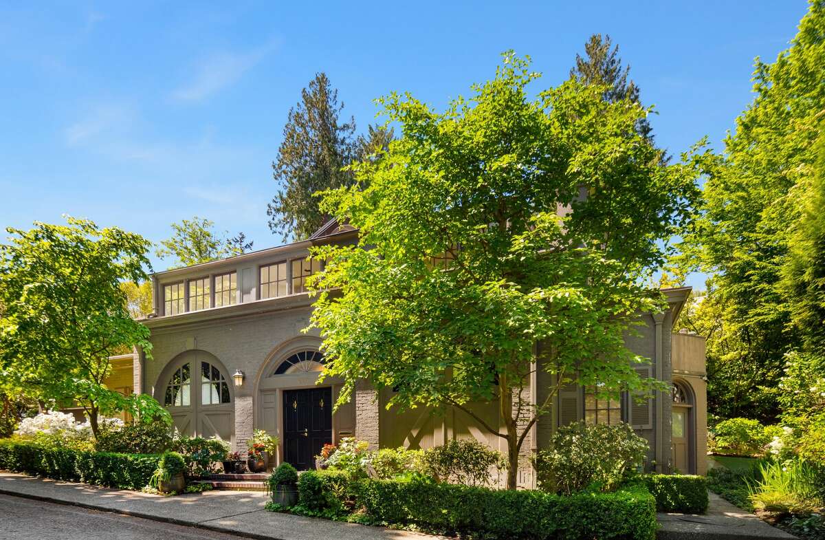 Historic outside, modern marvel inside, the Carriage House in Denny Blaine asks $3.9M