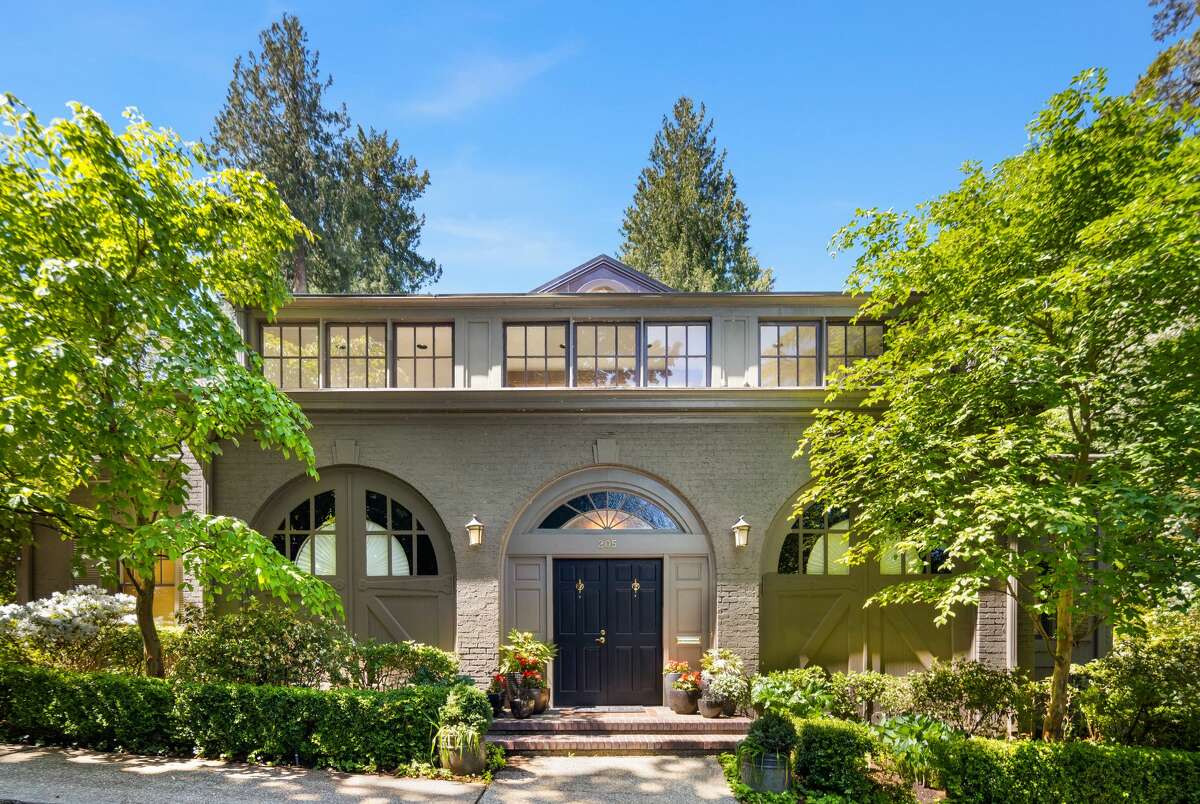 Historic outside, modern marvel inside, the Carriage House in Denny Blaine asks $2.9M