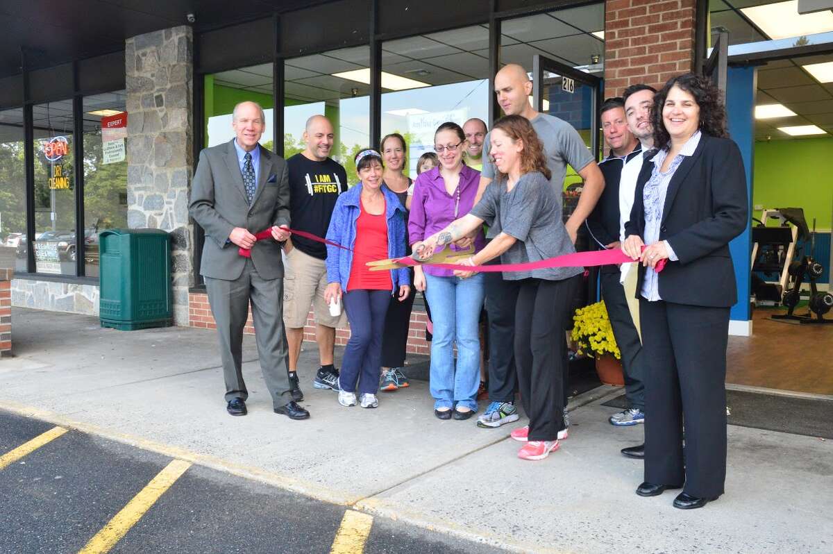 Bill Purcell, Chamber President, Lou Noujaim, Beach Body Coach, Marlene Cavagnuolo, Debbie Sacatta, Time Werner, Beach Body Coach, Owners Jennifer Telesco, David Telesco, and Jolene Messere, Sky Wells, Andrew Frentress and Laura Gorman