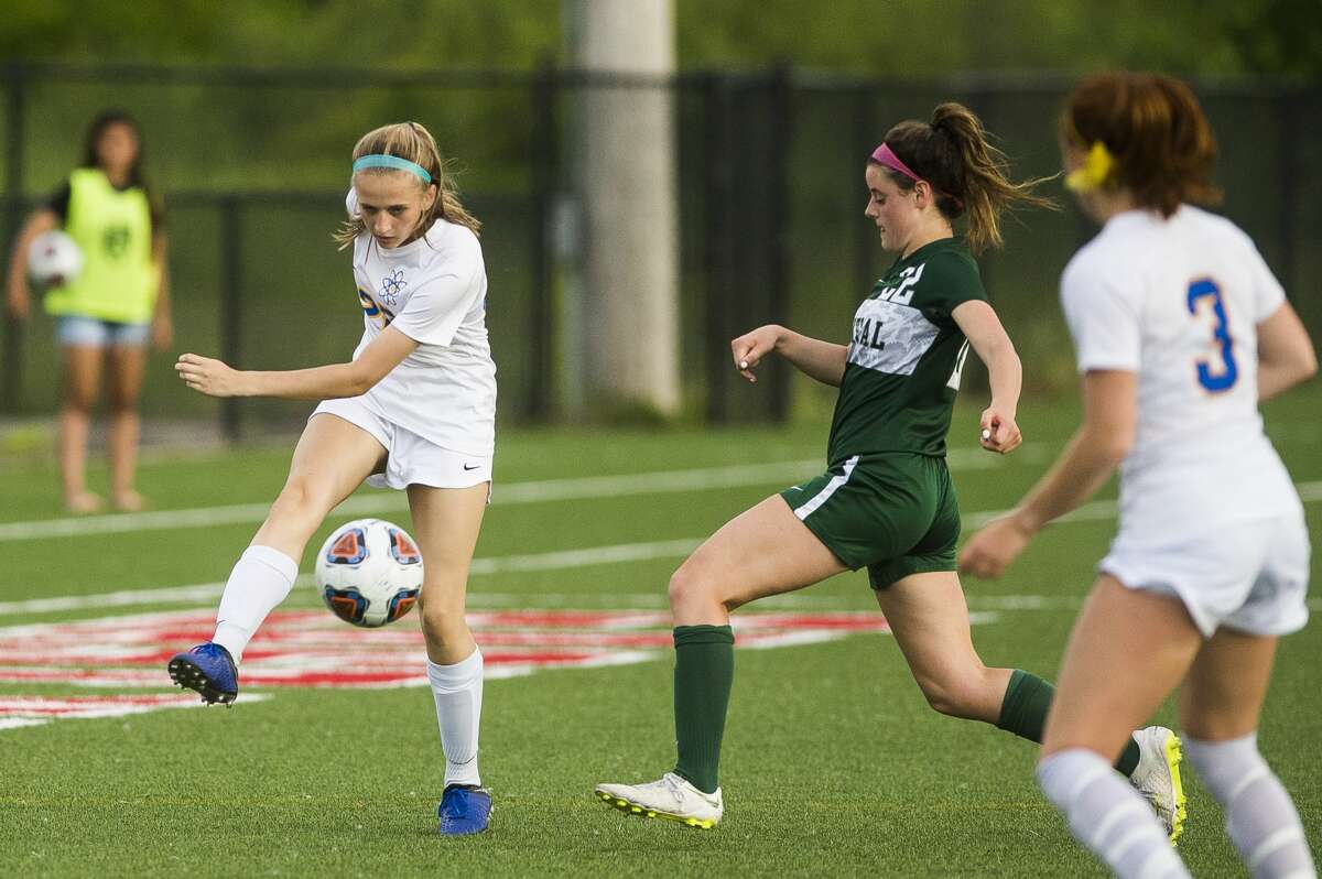 Midland's Lauren Shephard sends the ball down the field during the Chemics' 2-0 regional finals loss to Forest Hills Central on Thursday, June 6, 2019 in Kentwood. (Katy Kildee/kkildee@mdn.net)
