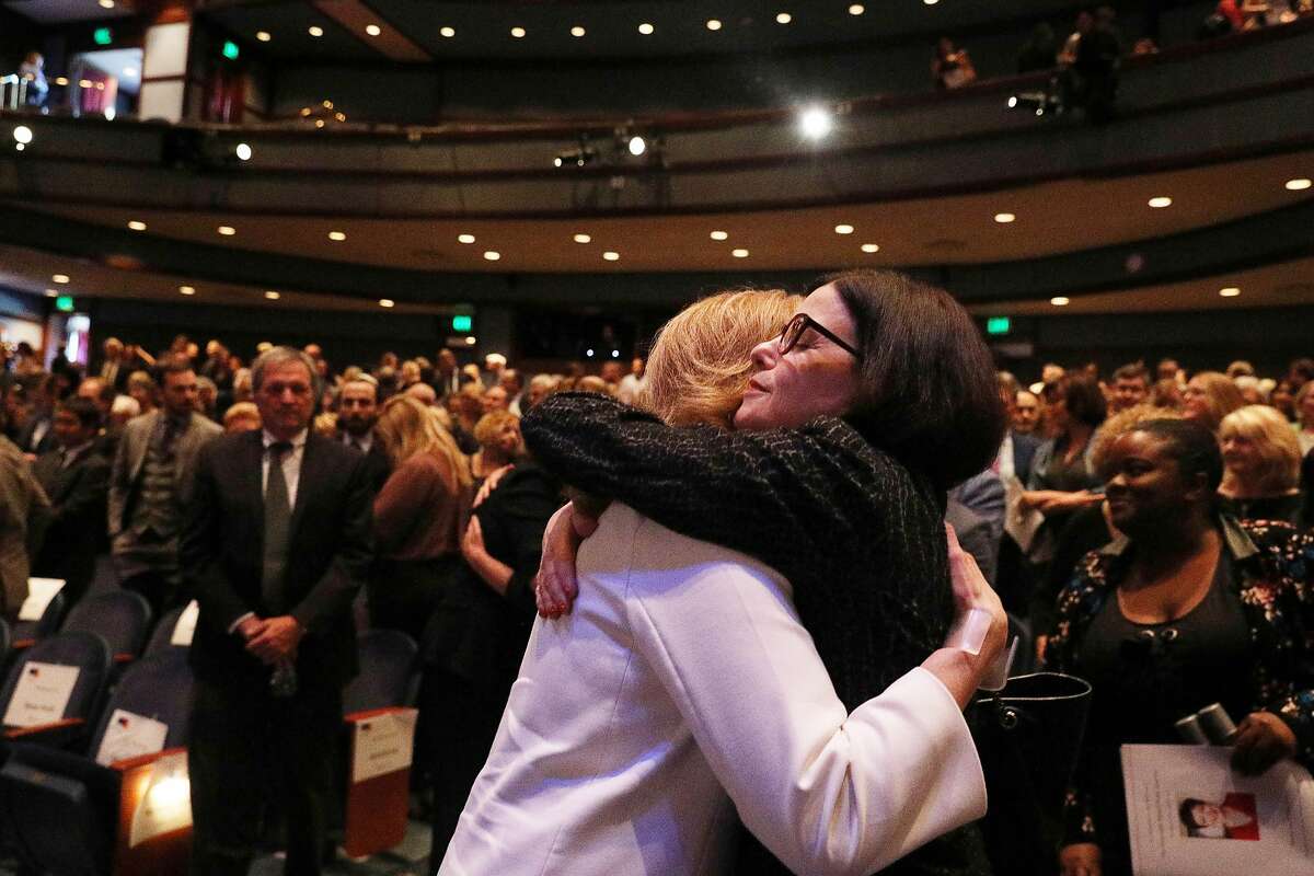 Katie Merrill (l to r), who was Ellen Tauscher's first campaign manager, first chief of staff and worked with her for 23 years, and Katherine Feinstein, daughter of Senator Dianne Feinstein, embrace at the end of the memorial service for former congresswoman Ellen Tauscher at the Lesher Center for the Arts on Thursday, June 6, 2019 in Walnut Creek, Calif.