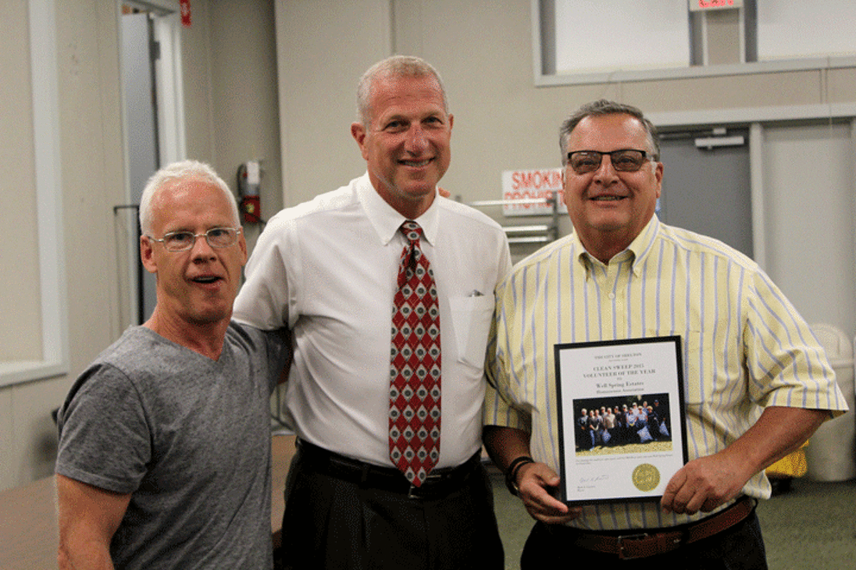 Gil Pastor & Mayor Lauretti present John Coniglio with the Volunteer of the Year award for the group category