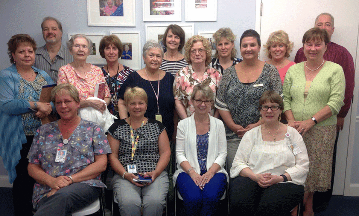 Photo Caption: Staff and volunteers from Wesley Village complete training and instruction for Music & Memory, a personalized, therapeutic music program being introduced on the campus this summer.