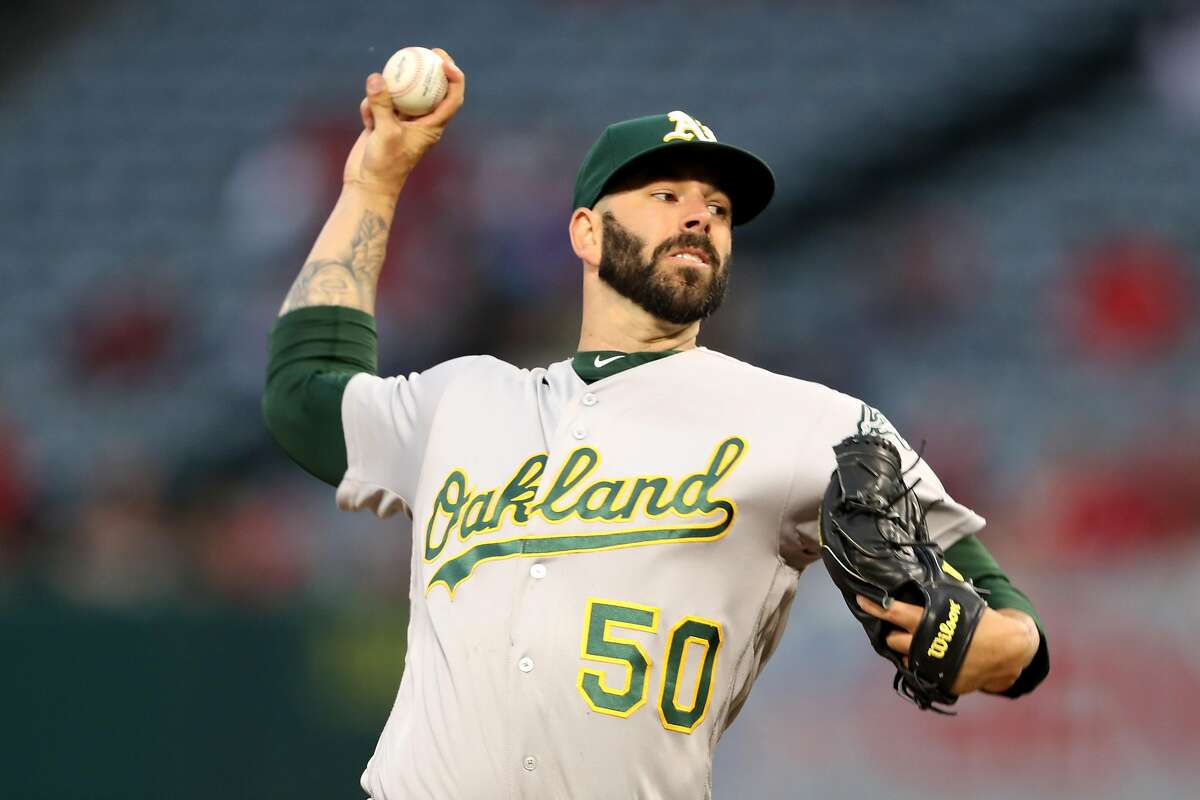 ANAHEIM, CALIFORNIA - JUNE 06: Mike Fiers #50 of the Oakland Athletics pitches during the first inning of a game against the Los Angeles Angels of Anaheim at Angel Stadium of Anaheim on June 06, 2019 in Anaheim, California. (Photo by Sean M. Haffey/Getty Images)