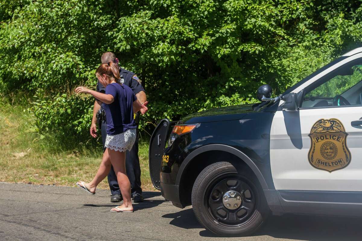 Shelton Police organized a mock DUI checkpoint procedure which featured a SHS student who was not under the influence during the reenactment. -- Aaron Berkowitz photo.