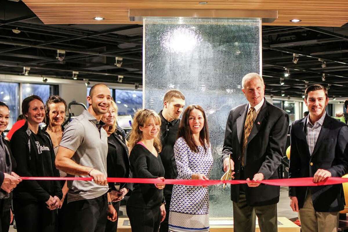Owner Rob Rodriguez, along with some staff members, Mayor Mark Lauretti, and Jimmy Tickey of the Planning and Zoning Commission.