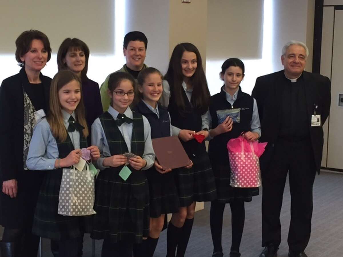 Ellie Cremin, Casey and Riley Nichols, Mia and Alexa Koletsos, the teacher leading the Knitting Club is Lisa Sheffield.