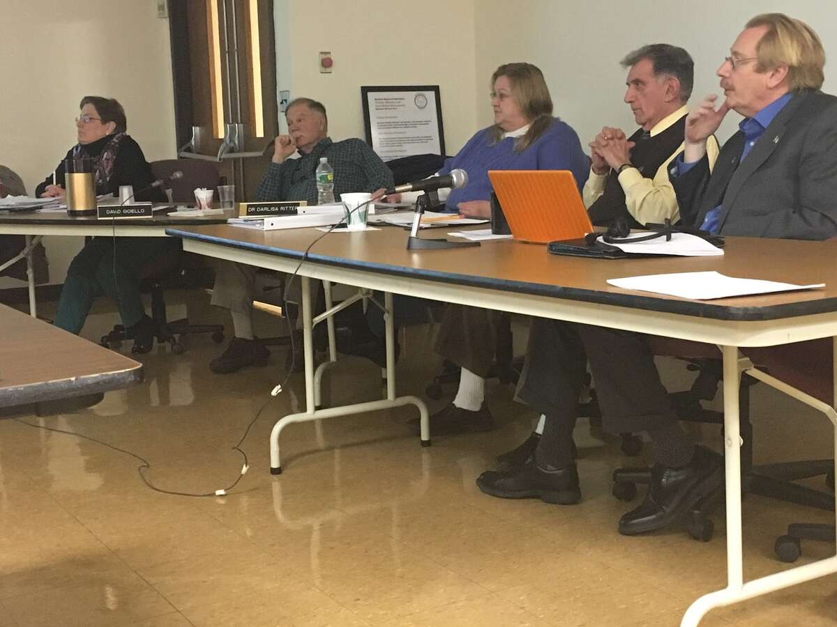 (From Left to right) Kate Kutash, David Gioiello, Dr. Darlisa Ritter, Tom Minotti, and Chairman Mark Holden are shown discussing possible cuts during a budget workshop. - Aaron Berkowitz photo