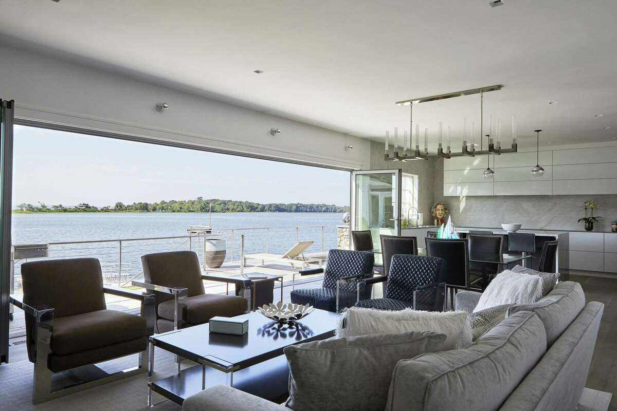 The interior of a Shingle-style home is fully open and “modern”: allowing full connection between those in the home and the waterside site.