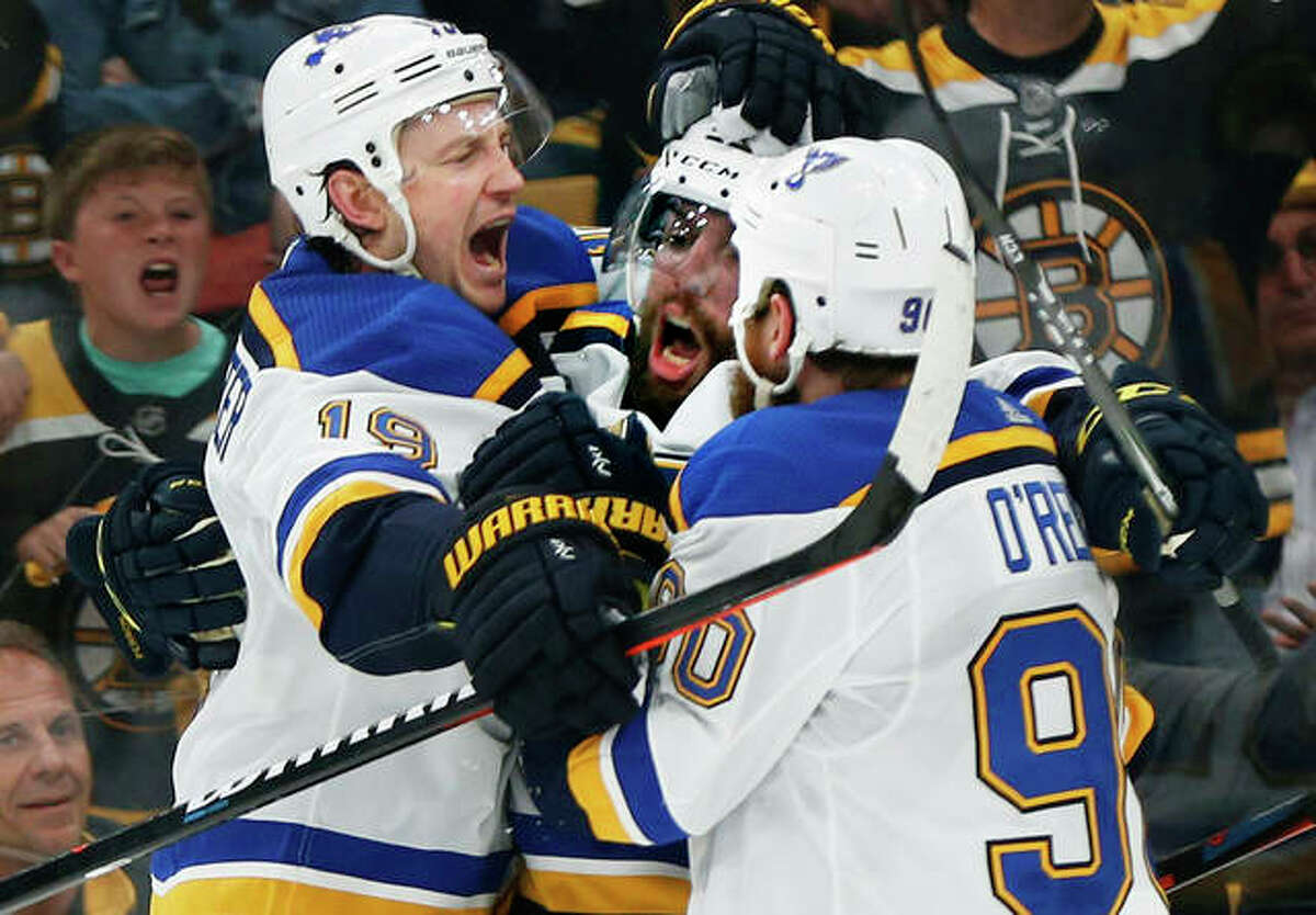 The Blues’ David Perron (center) celebrates his goal with teammates Jay Bouwmeester (left) and Ryan O’Reilly during the third period in Game 5 of the Stanley Cup Final on Thursday night in Boston.