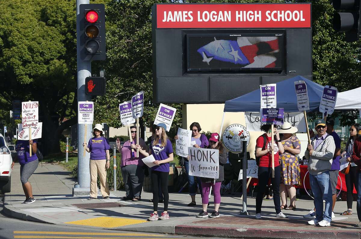 Teachers continue to walk on a picket line at James Logan High School in Union City, Calif. on Tuesday, June 4, 2019. A strike by teachers from the New Haven Unified School District is in its third week.