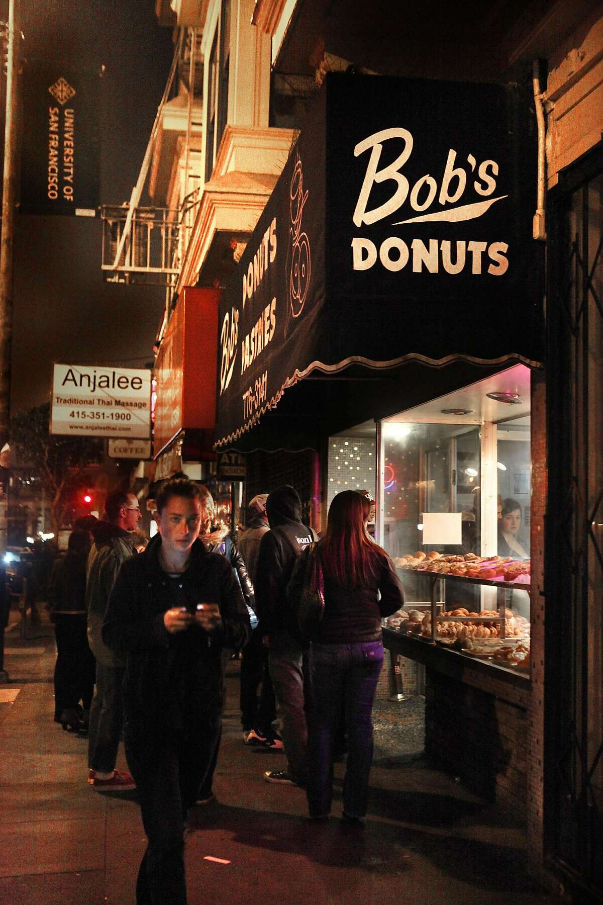 After hour patrons line up outside of Bob's Donuts on Polk St. in San Francisco, Calif., on Friday, February 22, 2013.