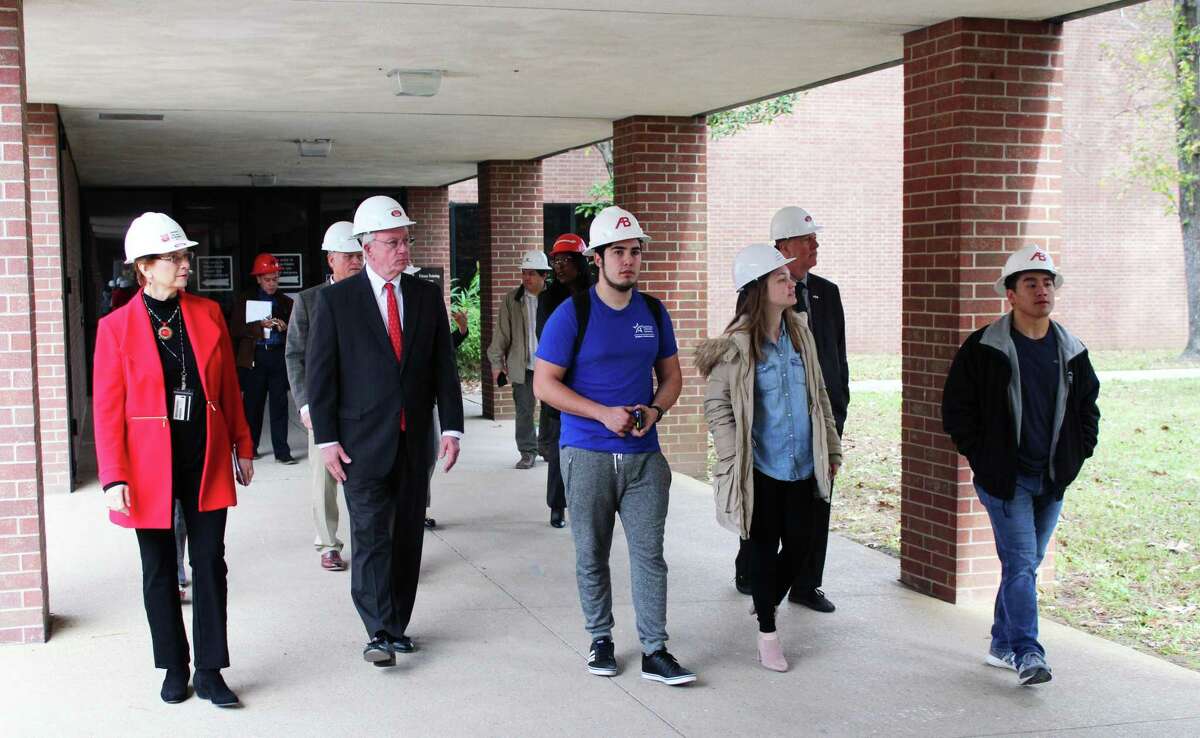 Previously, the Lone Star College System had received just a few thousand dollars for the money spent on campus renovations and repairs due to Hurricane Harvey damage, the majority of which affected LSC-Kingwood. Now, they’ve received $530,000. Here, Lone Star College- Kingwood President Katherine Persson gives a tour to LSC Kingwood students and staff of their new buildings on Dec. 17, 2018. The Kingwood campus was heavily affected by Hurricane Harvey and had to renovate 6 of their buildings.