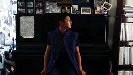 Christopher Nguyen, a 12-year old classical pianist, who has over a 120 classical pieces memorized and enjoys playing everything from FrŽdŽric Chopin ƒtude Op. 10, No. 3 to George Gershwin's Rhapsody in Blue, sits by his favorite piano which is in his home and looks out the window on June 1, 2019 in San Leandro, California.