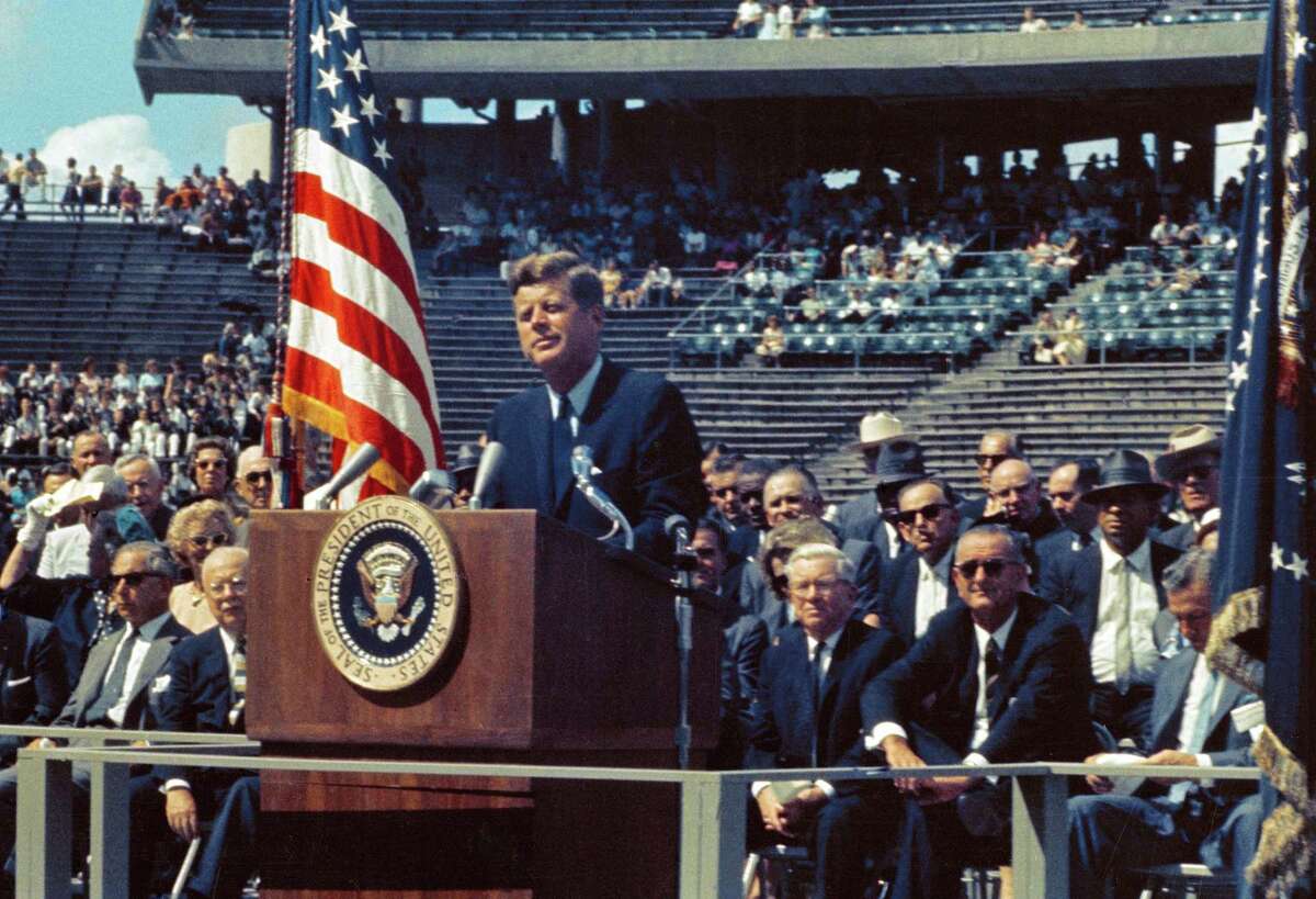 On Sept. 12, 1962, President John F. Kennedy tells a crowd of 35,000 at Rice University Stadium in Houston, Texas, "We choose to go to the Moon in this decade and do the other things, not because they are easy, but because they are hard, because that goal will serve to organize and measure the best of our energies and skills, because that challenge is one that we are willing to accept, one we are unwilling to postpone, and one in which we intend to win, and the others, too."