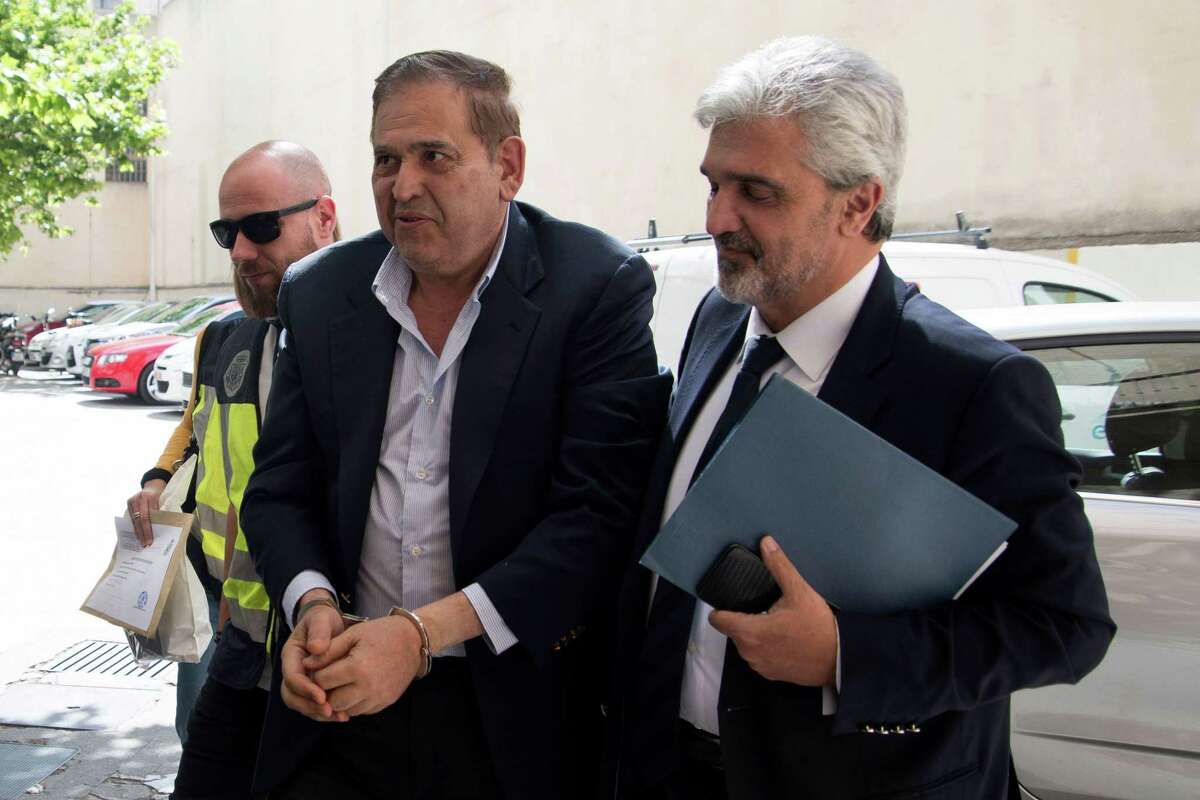 Alonso Ancira (C), head of Altos Hornos de Mexico, arrives to court in Palma de Mallorca on May 29, 2019 after being arrested on the Spanish island. - The Mexican executive accused of orchestrating the sale of a defunct business to state oil company Pemex for nearly half a billion dollars was arrested on May 28 on the Spanish island of Mallorca, his firm said. (Photo by STR / AFP)STR/AFP/Getty Images