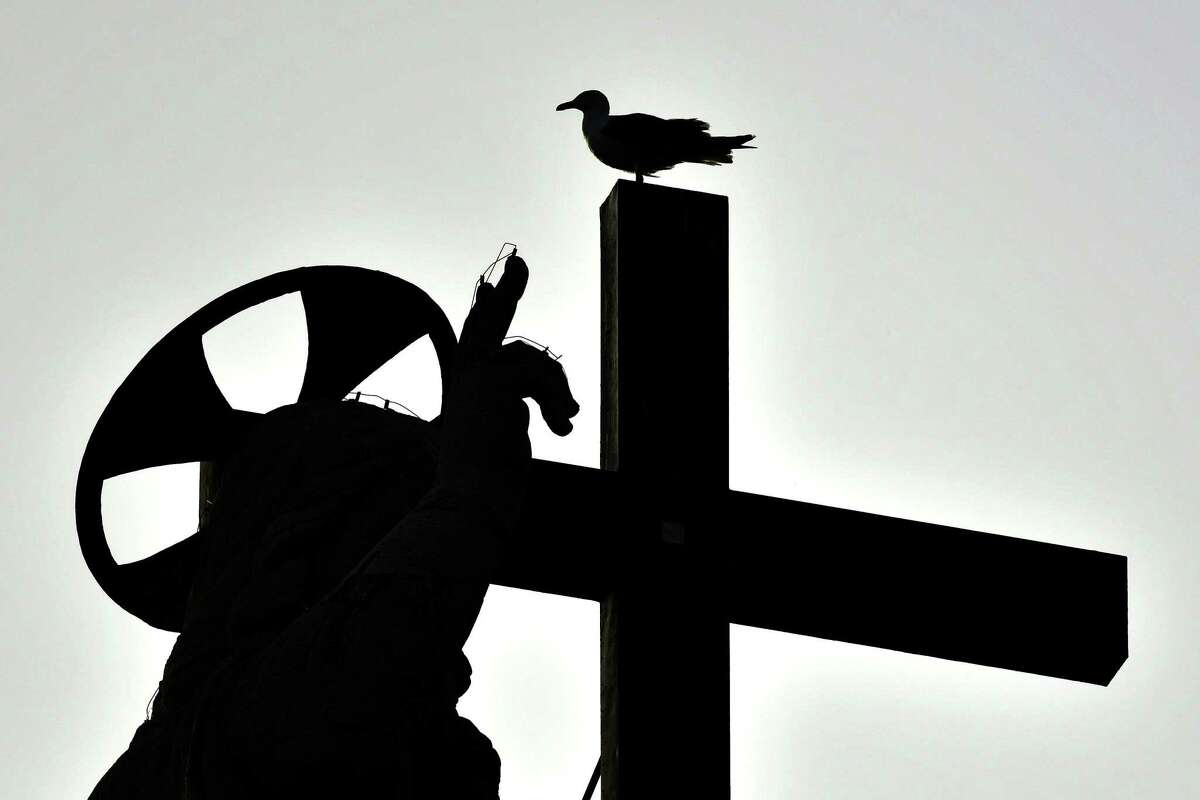 A seagull stand on the cross on the Basilica dome as the Pope Francis celebrates the Pentecost mass-vigil on June 8, 2019 In Saint Peter's square at the Vatican. (Photo by Alberto PIZZOLI / AFP)ALBERTO PIZZOLI/AFP/Getty Images