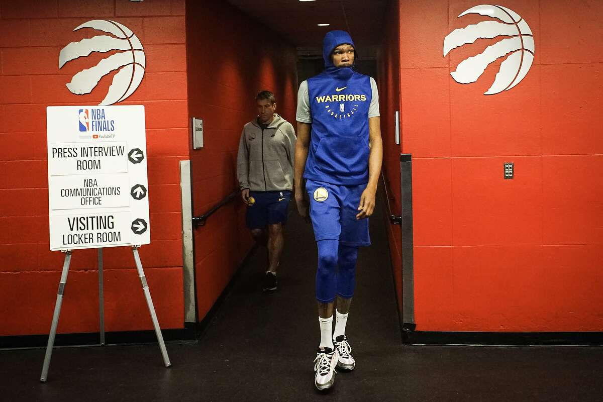Golden State Warriors' Kevin Durant leaves the Toronto Raptors' locker room area to head to the arena floor for a team practice on Sunday, June 9, 2019 at Scotiabank Arena in Toronto, Ontario, Canada.