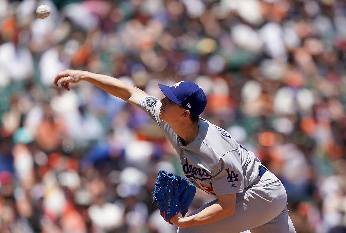 Giants' Madison Bumgarner shouts at Dodgers' Max Muncy after home run