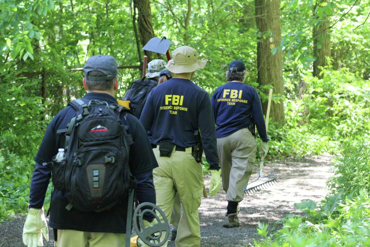 Members of an FBI Evidence Response Team searched Waveny Park near the bridge that carries Lapham Road over the Merritt Parkway Monday, June 3, as part of the Jennifer Dulos case.