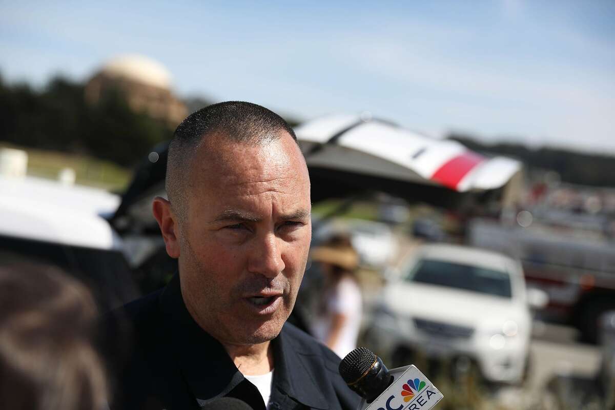 Lieutenant Jonathan Baxter speaks during a news conference at Crissy Field regarding a 14-year-old boy who seen struggling in the water and pulled from the water after being spotted about 25 yards from the shoreline by divers on Monday, June 10, 2019 in San Francisco, Calif.