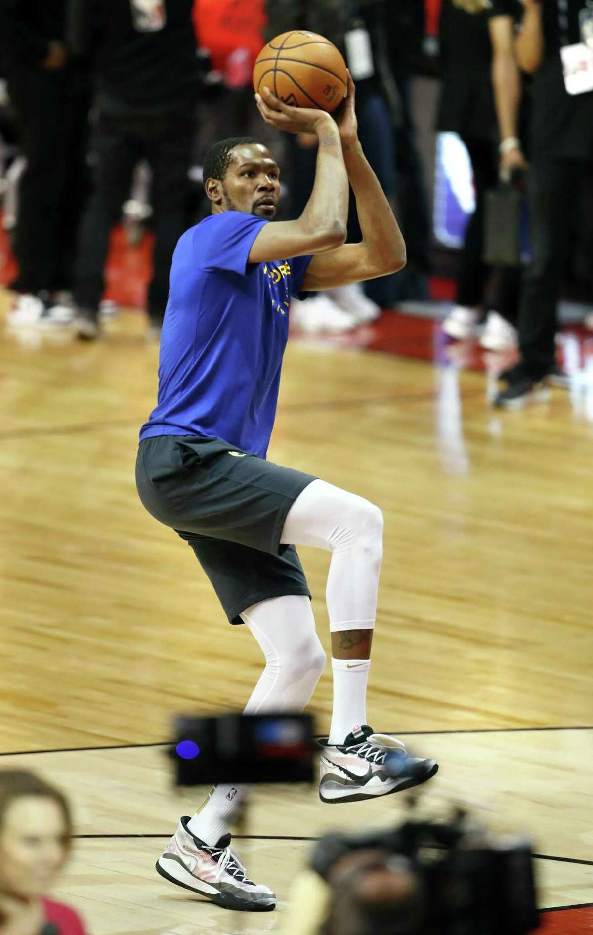 Golden State Warriors' Kevin Durant warms up before playing against Toronto Raptors in NBA Finals' Game 5 at Scotiabank Arena in Toronto, Ontario, on Monday, June 10, 2019.