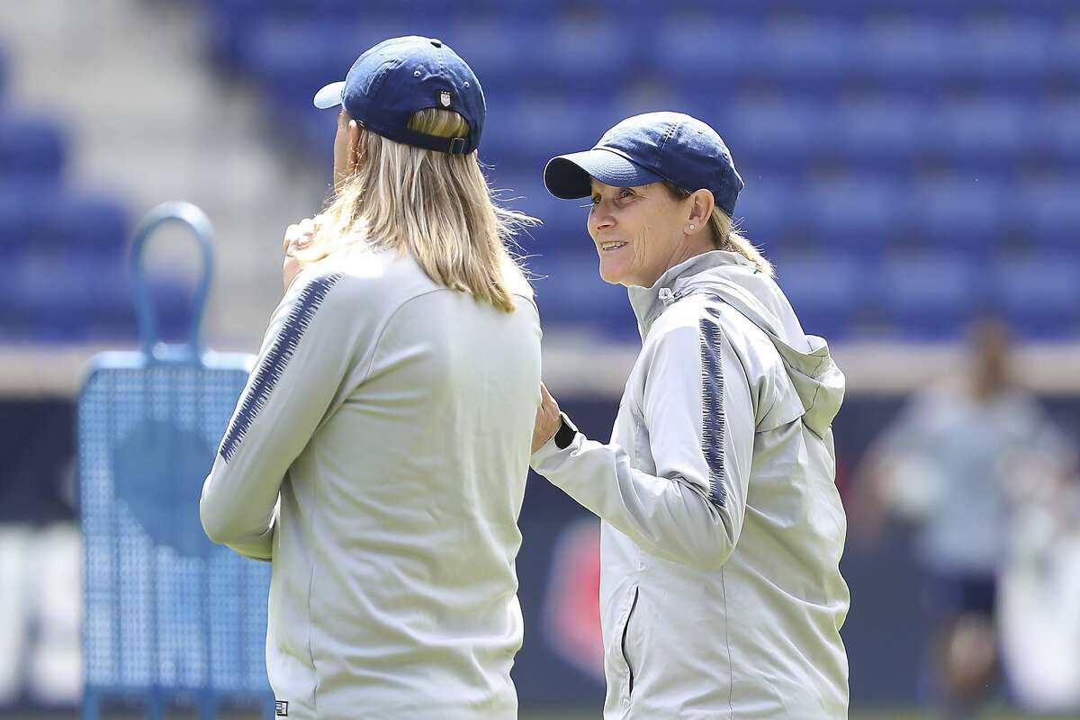 United States women's national soccer team head coach Jill Ellis, right, is seen during a soccer workout at Red Bull Arena, Saturday, May 25, 2019, in Harrison, N.J. The U.S. will play against Mexico in an international soccer friendly on Sunday. (AP Photo/Steve Luciano)