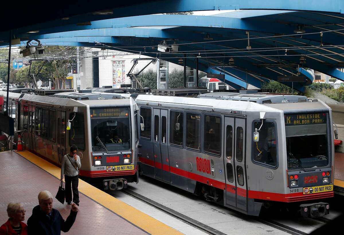 Muni Metro light rail vehicles arrive and depart from the West Portal station in San Francisco, Calif. on Saturday, Aug. 25, 2018. The SFMTA reopened the Twin Peaks tunnel to light rail service Saturday following a two-month closure for an extensive restoration project.