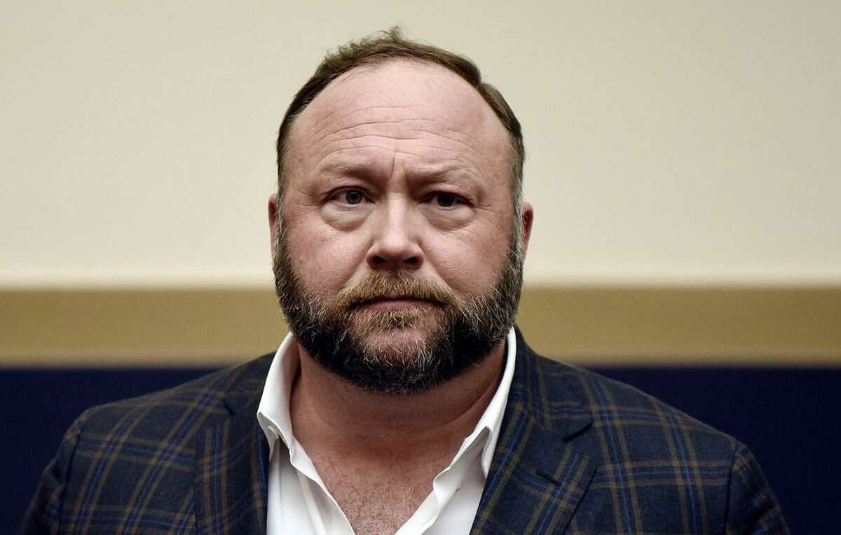 Infowars founder Alex Jones attends Google CEO Sundar Pichai's hearing before the House Judiciary committee on Capitol Hill Dec. 11, 2018 in Washington, D.C.