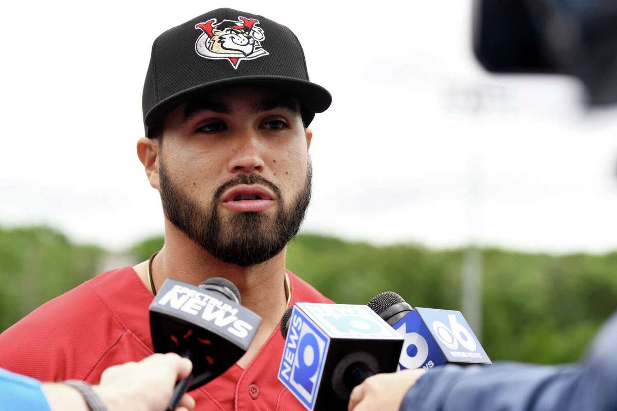 Ozney Guillen, new ValleyCats manager, meets the media outside the ValleyCats dugout on Tuesday, June 11, 2019, at Joseph L. Bruno Stadium in Troy, N.Y. (Catherine Rafferty/Times Union)