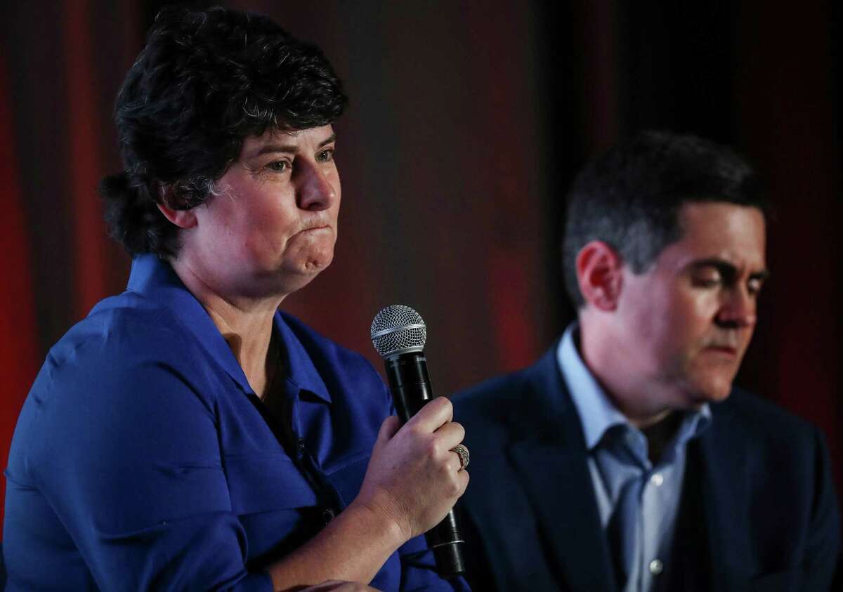 Susan Codone, left, shares her story of being sexually abused during a panel discussion about sexual abuse and the Southern Baptist Convention, as Russell Moore, right, president of the Ethics and Religious Liberty Commission of the SBC, listens on the eve of the SBC's annual meeting on Monday, June 10, 2019, in Birmingham.