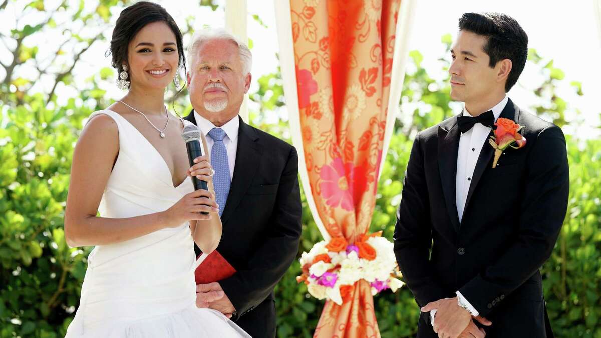 Carolina (Feliz Ramirez) looks every inch the bride next to her fiance (Ken Kirby, far right) until the event turns into an angry brawl.
