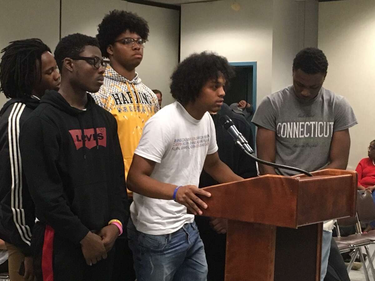 Members of the Harding High School Football team plead with the board not to cut the district sports budget. Said Harding student athlete Xavier Reid, school and sports keeps him off the streets.