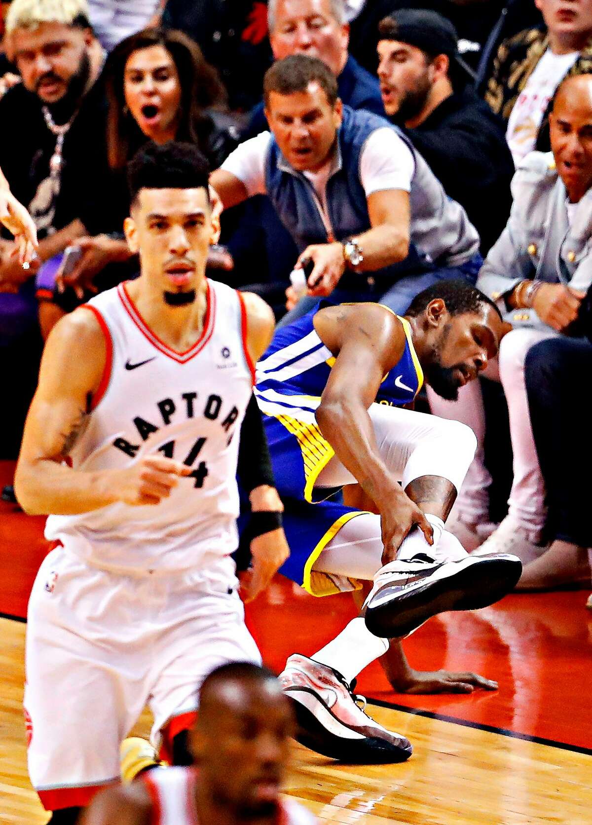 Golden State Warriors' Kevin Durant suffers an achilles injury during Warriors' 106-105 win over Toronto Raptors in NBA Finals' Game 5 at Scotiabank Arena in Toronto, Ontario, on Monday, June 10, 2019.