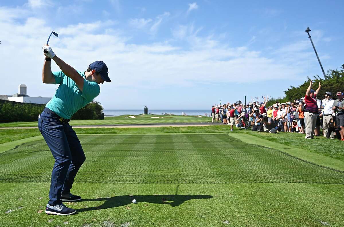 PEBBLE BEACH, CALIFORNIA - JUNE 11: Rory McIlroy of Northern Ireland plays a shot from the 17th tee during a practice round prior to the 2019 U.S. Open at Pebble Beach Golf Links on June 11, 2019 in Pebble Beach, California. (Photo by Ross Kinnaird/Getty Images)