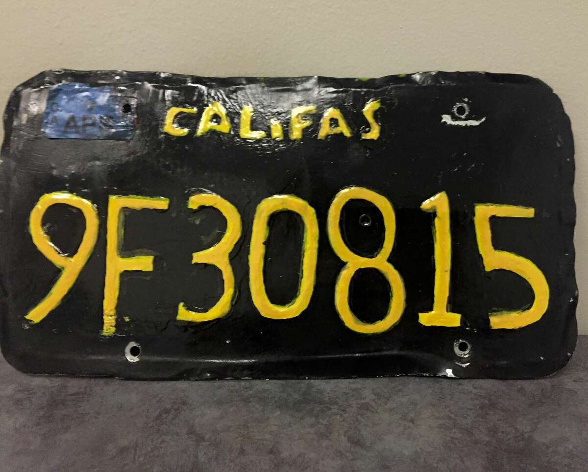 This undated photo provided by the Ventura County Sheriff's Department shows a phony license plate that was spotted by a motorcycle officer on a tractor-trailer in Moorpark, Calif., northwest of Los Angeles. The Ventura County Sheriff's Department said Monday, June 10, 2019, that the driver was arrested and the truck was towed away because it was unsafe. (Ventura County Sheriff's Department via AP)