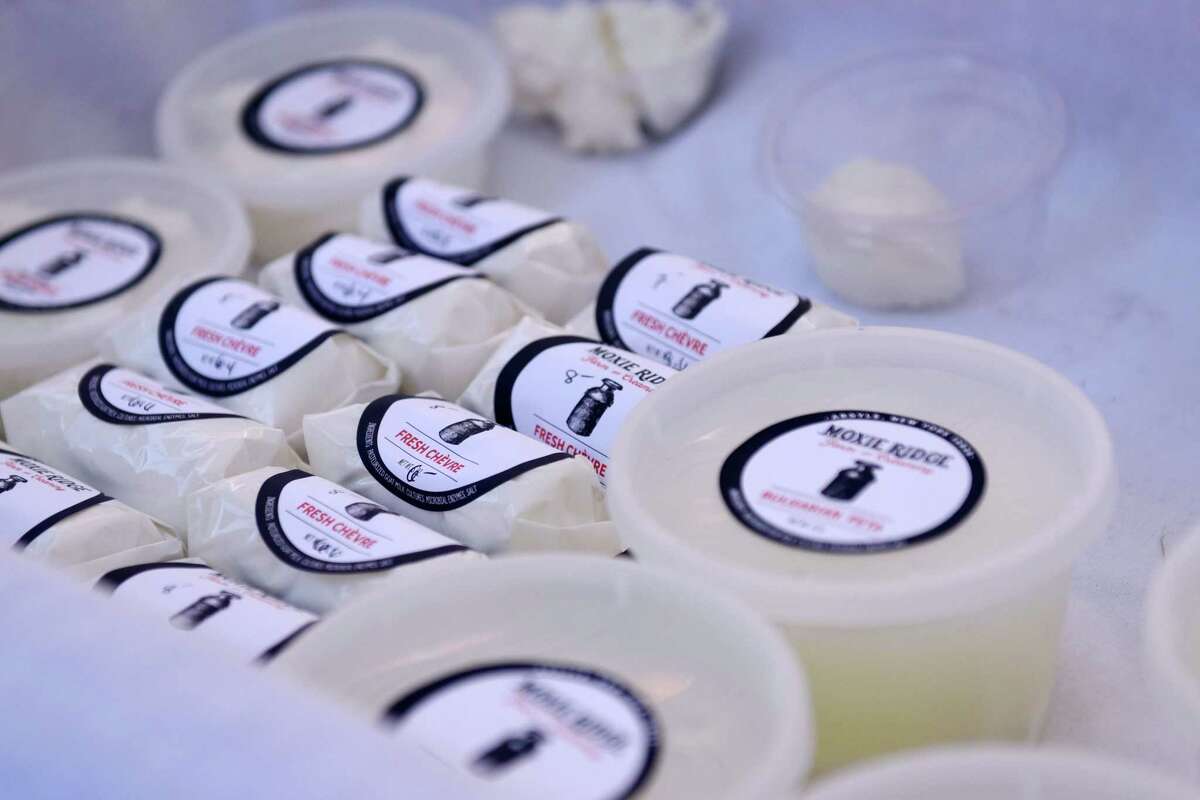 Moxie Ridge Creamery owner Lee Hennessy sells various types of goat cheese at his booth on Saturday, June 8, 2019 at the Troy Farmers Market in Troy, NY. (Phoebe Sheehan/Times Union)