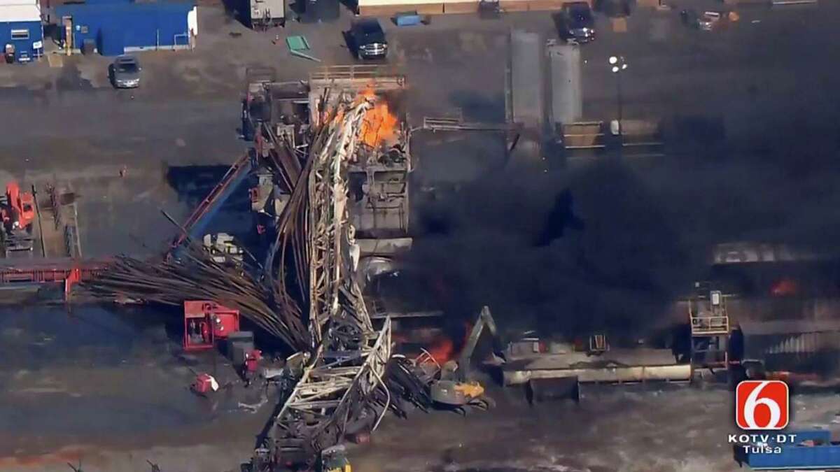 In this photo provided from a frame grab from Tulsa's KOTV/NewsOn6.com, fires burn at an eastern Oklahoma drilling rig near Quinton, Okla., Monday Jan. 22, 2018. The accident involving a Houston drilling company was the industry’s deadliest since the Deepwater Horizon tragedy 10 years ago, but the regulatory response to the Oklahoma explosion has been far less urgent.